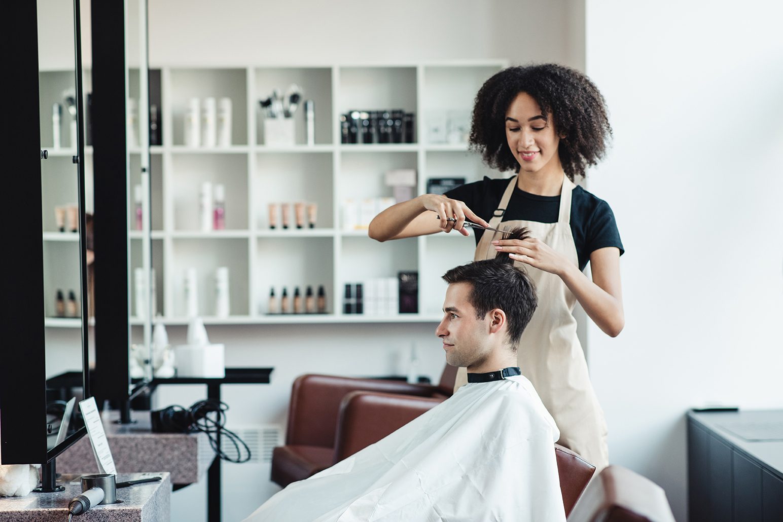 Image of a man getting his hair cut