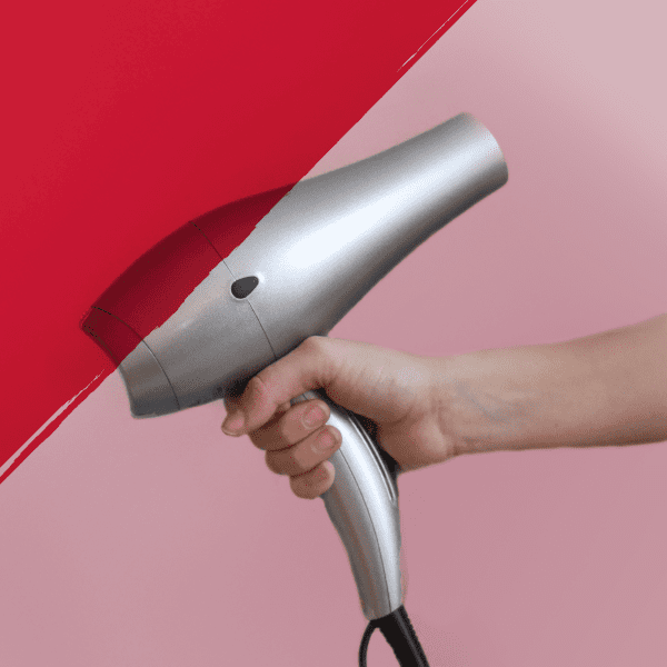 Person Holding a hair dryer